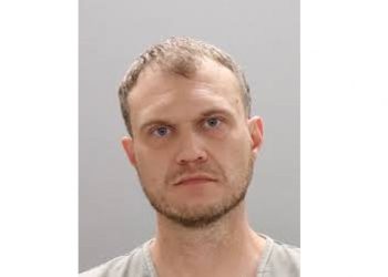 Knoxville Man Arrested After Firing Shots at Residence